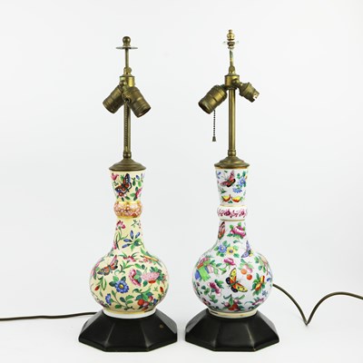 Lot 171 - A NEAR PAIR OF CHINESE FAMILLE ROSE PORCELAIN BOTTLE LAMPS. (2)