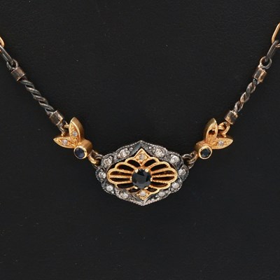 Lot 276 - AN 18CT GOLD AND SILVER DIAMOND SET NECKLACE