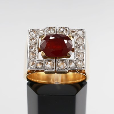 Lot 220 - AN 18CT GOLD RUBY AND DIAMOND SET GENTS DRESS RING
