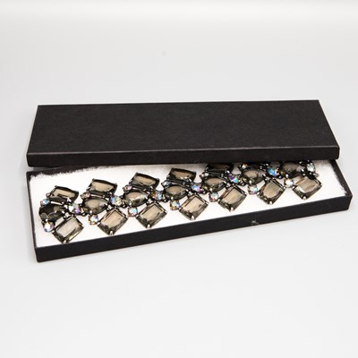 Lot 256 - SCHIAPARELLI, A 1950s FANTASY PASTE SET BRACELET