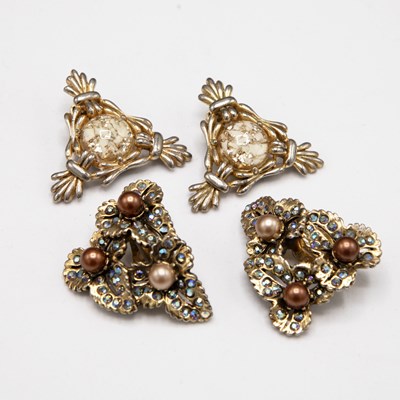 Lot 284 - SCHIAPARELLI, TWO PAIRS OF 1950s GILT METAL CLIP-ON EARRINGS