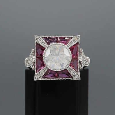 Lot 225 - A PLATINUM RUBY AND DIAMOND DRESS RING