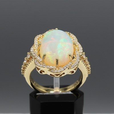 Lot 222 - A 9CT GOLD OPAL AND DIAMOND SET DRESS RING