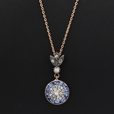 Lot 217 - AN 8CT ROSE GOLD SAPPHIRE AND DIAMOND CLUSTER PENDANT