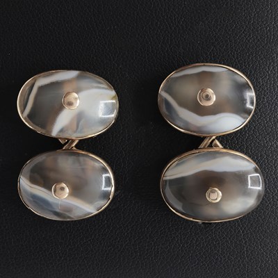 Lot 234 - A PAIR OF YELLOW METAL AGATE SET CUFFLINKS