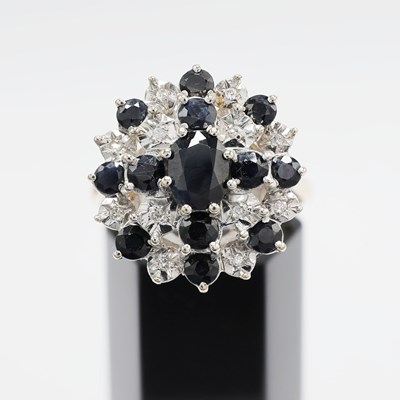 Lot 227 - A 9CT GOLD SAPPHIRE AND DIAMOND DRESS RING