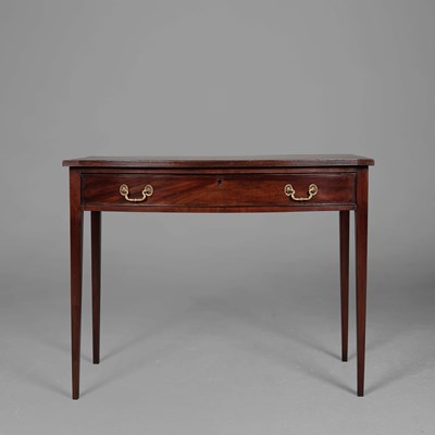 Lot 338 - GEORGE III MAHOGANY BOWFRONT WRITING TABLE