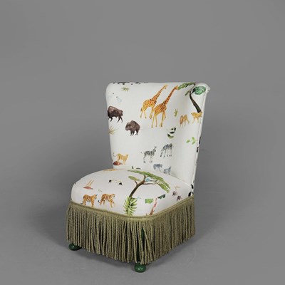 Lot 674 - SLIPPER CHAIR IN ANIMAL PRINT FABRIC.