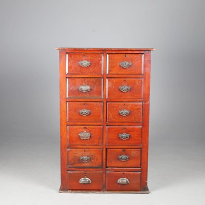 Lot 312 - VICTORIAN STAINED PINE BANK OF TWELVE DRAWERS.