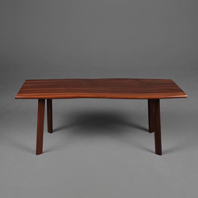 Lot 864 - SHAPED HARDWOOD COFFEE TABLE.
