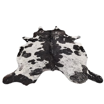 Lot 860 - COWSKIN RUG.