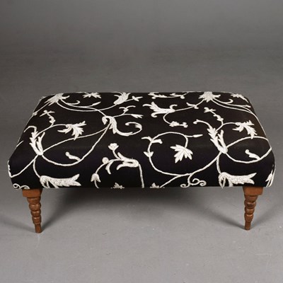 Lot 747 - FOOTSTOOL WITH EMROIDERED UPHOLSTERY ON BOBBIN SUPPORTS.