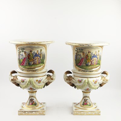 Lot 250 - A PAIR OF DRESDEN PORCELAIN URNS. (2)