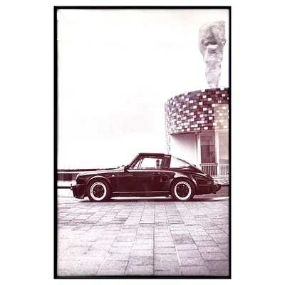Lot 58 - PHOTOGRAPHIC PRINT OF A PORCHE PARKED BY THE SEA