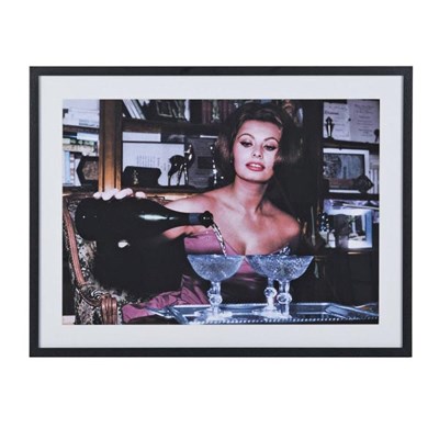 Lot 59 - PHOTOGRAPHIC PRINT OF SOPHIA LOREN POURING CHAMPAGNE