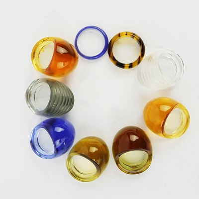 Lot 323 - LALIQUE, A COLLECTION OF SEVEN VARIOUS GLASS DRESS RINGS