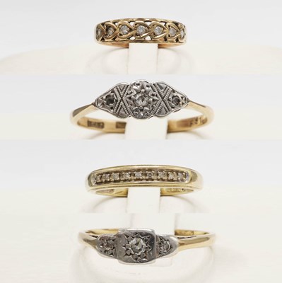 Lot 269 - A COLLECTION OF FOUR ASSORTED 9CT GOLD DIAMOND DRESS RINGS