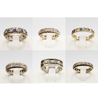 Lot 240 - A COLLECTION OF SIX ASSORTED 9CT GOLD ETERNITY RINGS