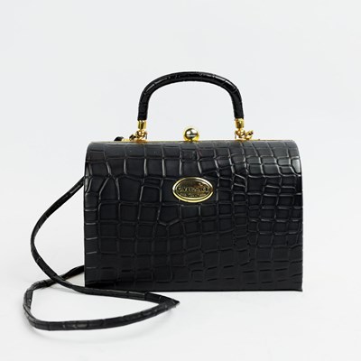 Lot 60 - A GIANNI VERSACE BLACK BOX BAG.