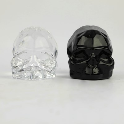 Lot 200 - TWO GLASS SKULLS (2)