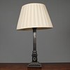 Lot 100 - A LARGE SILVER-PLATED CORINTHIAN COLUMN LAMP WITH PLEATED SILK SHADE. (2)