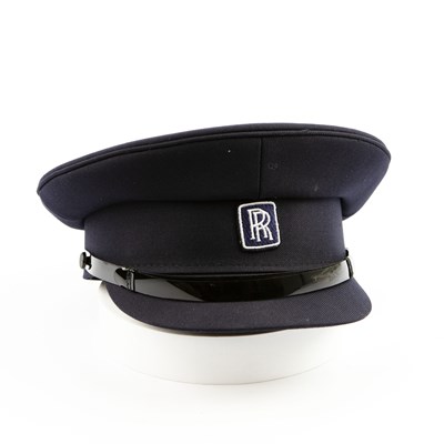 Lot 256 - A ROLLS ROYCE CHAUFFEURS NAVY BLUE PEAKED HAT.