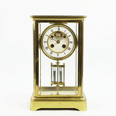 Lot 170 - A FRENCH FOUR GLASS GILT METAL MANTEL CLOCK