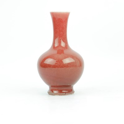 Lot 225 - A CHINESE MONOCHROME SANG DE BOEUF BOTTLE VASE.