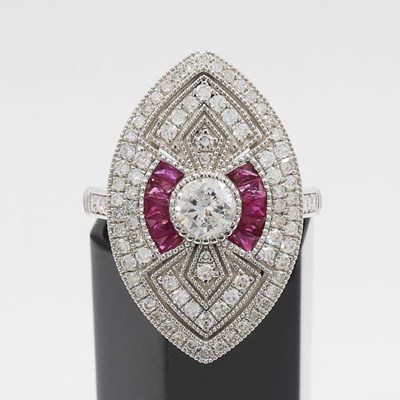 Lot 192 - A PLATINUM DIAMOND AND RUBY RING