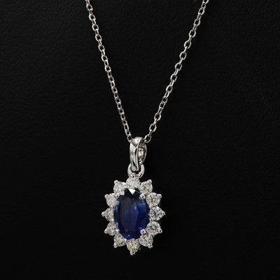 Lot 185 - 18CT WHITE GOLD OVAL SAPPHIRE PENDANT