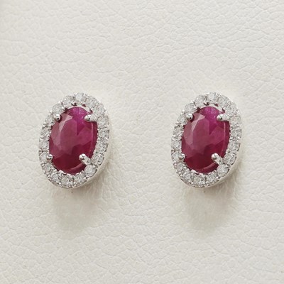 Lot 183 - A PAIR OF 9CT GOLD RUBY STUDS
