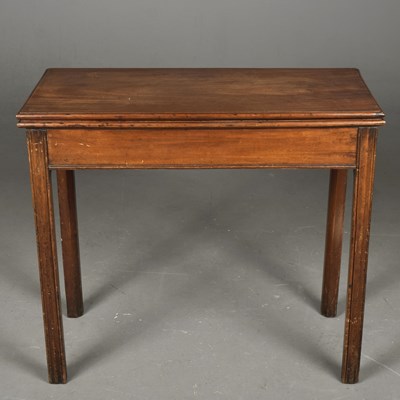 Lot 330 - A GEORGE III MAHOGANY FOLD-OVER TEA TABLE
