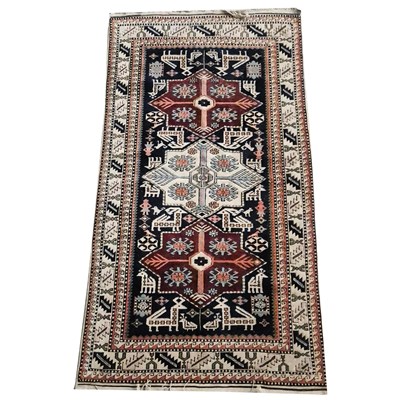 Lot 430 - CAUCASIAN RUG.