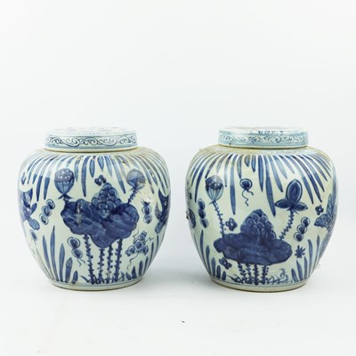 Lot 248 - CHINESE EXPORT STYLE BLUE AND WHITE CERAMIC GINGER JARS, A PAIR.