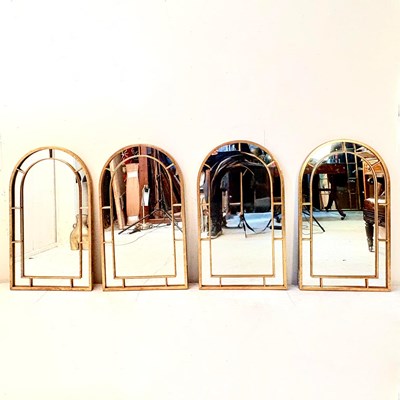 Lot 148 - SET OF FOUR ARCHED WALL MIRRORS WITH GILT METAL FRAMES.