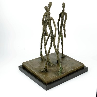 Lot 113 - AFTER ALBERTO GIACOMETTI, THREE MEN WALKING II STYLE STUDY.
