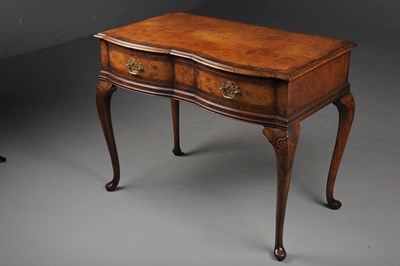 Lot 114 - QUEEN ANNE STYLE WALNUT SERPENTINE WRITING TABLE.