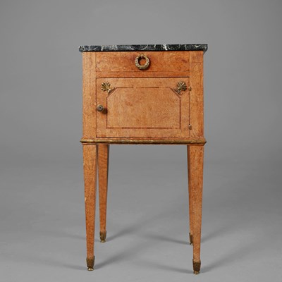 Lot 249 - FRENCH LOUIS XVI STYLE THUYA BEDSIDE CABINET WITH BLACK MARBLE TOP AND GILT METAL MOUNTS.