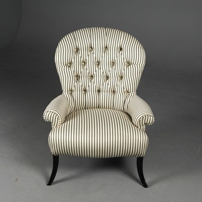 Lot 294 - EBONISED ARMCHAIR IN GREEN TICKING.