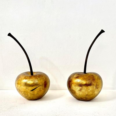 Lot 153 - PAIR OF OVERSIZED GILT FINISH CHERRIES.