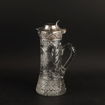 Lot 378 - A TIFFANY & CO SILVER MOUNTED CUT GLASS WATER PITCHER.