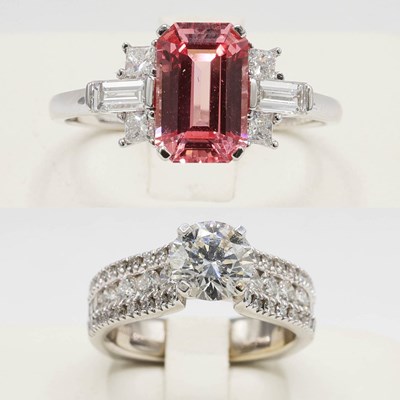 Lot 219 - AN 18CT WHITE GOLD PINK SAPPHIRE AND WHITE STONE DRESS RING.