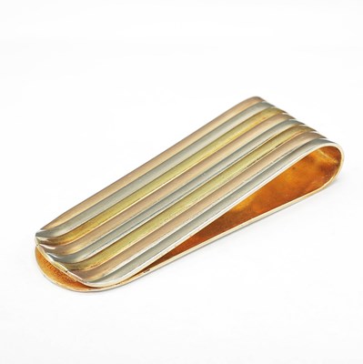 Lot 218 - A BULGARI 18CT GOLD MONEY CLIP.
